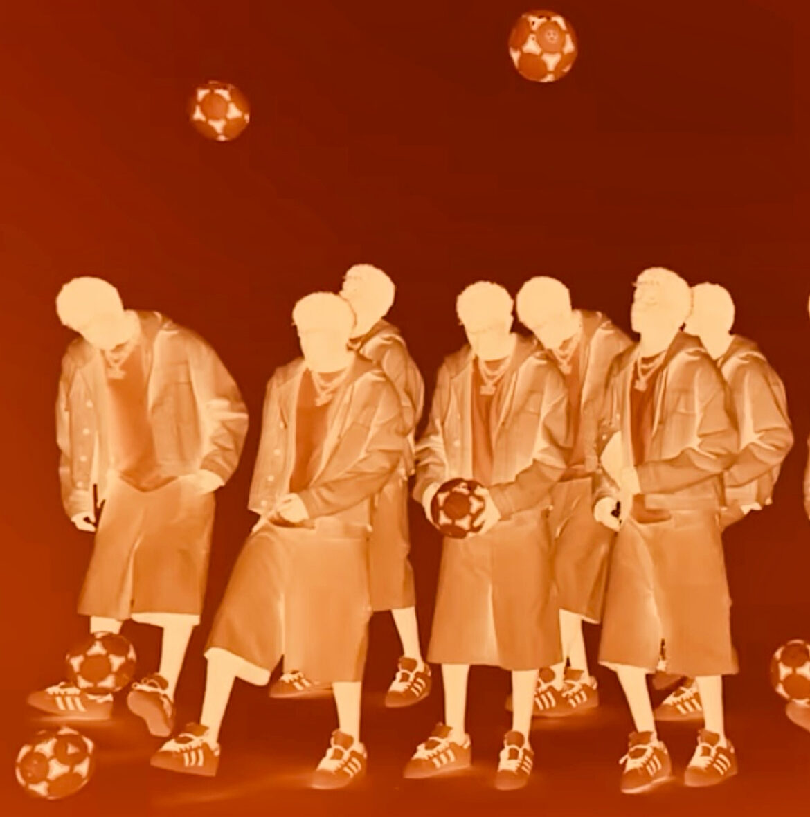 A stylized, monochromatic orange-toned composite photo features multiple overlapping figures of soccer player Lamine Lamal posing in streetwear. He wears a jacket, loose knee-length shorts, and sneakers, with several soccer balls scattered on the floor and floating in the background.